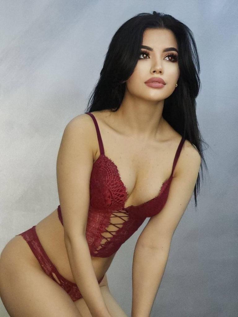 Elegant blonde companion in evening wear